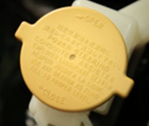 checking fluids power steering fluid | i.g. Burton Subaru of Glen Burnie in Glen Burnie MD