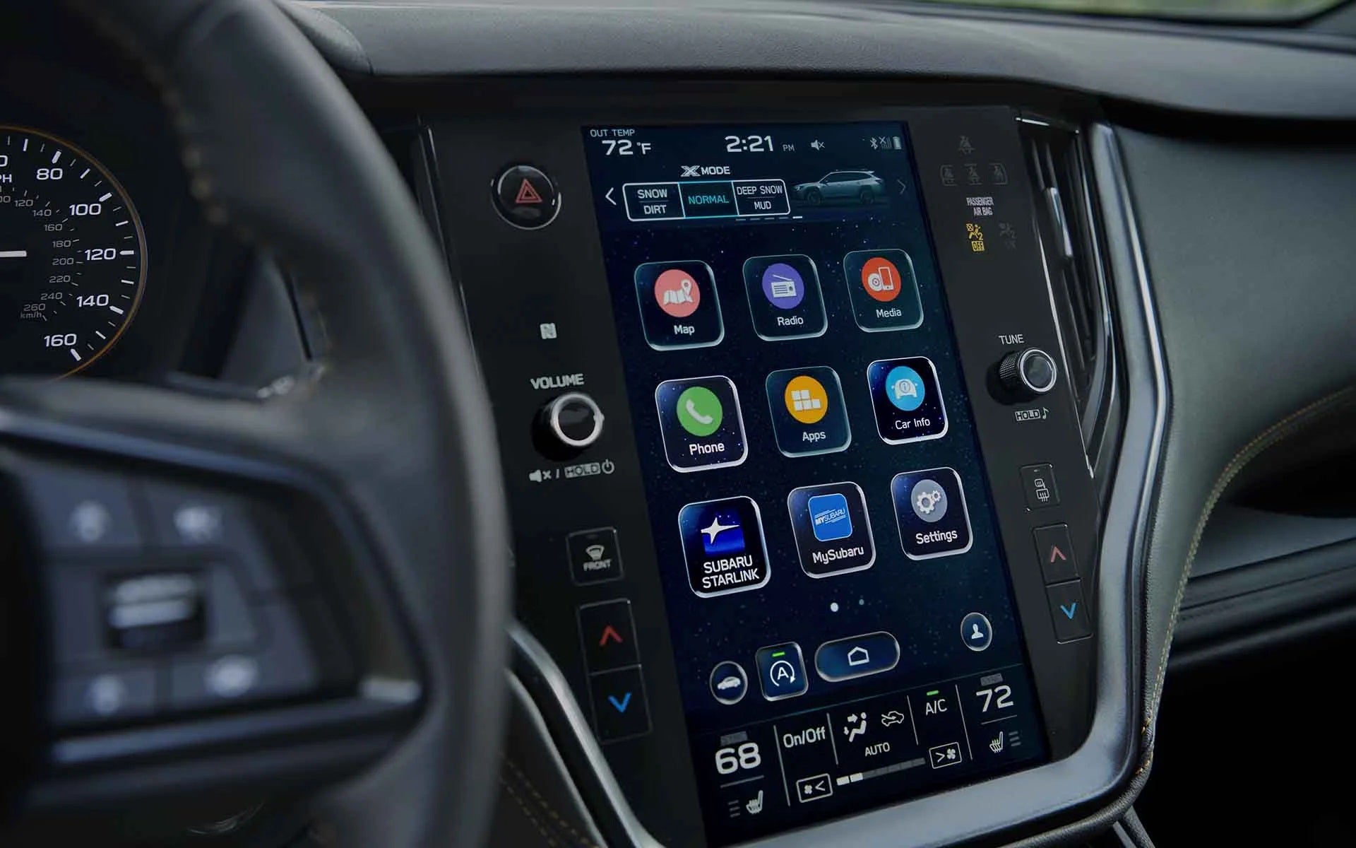Car dashboard with large infotainment screen displaying multiple app icons like Phone, Radio, and Navigation.
