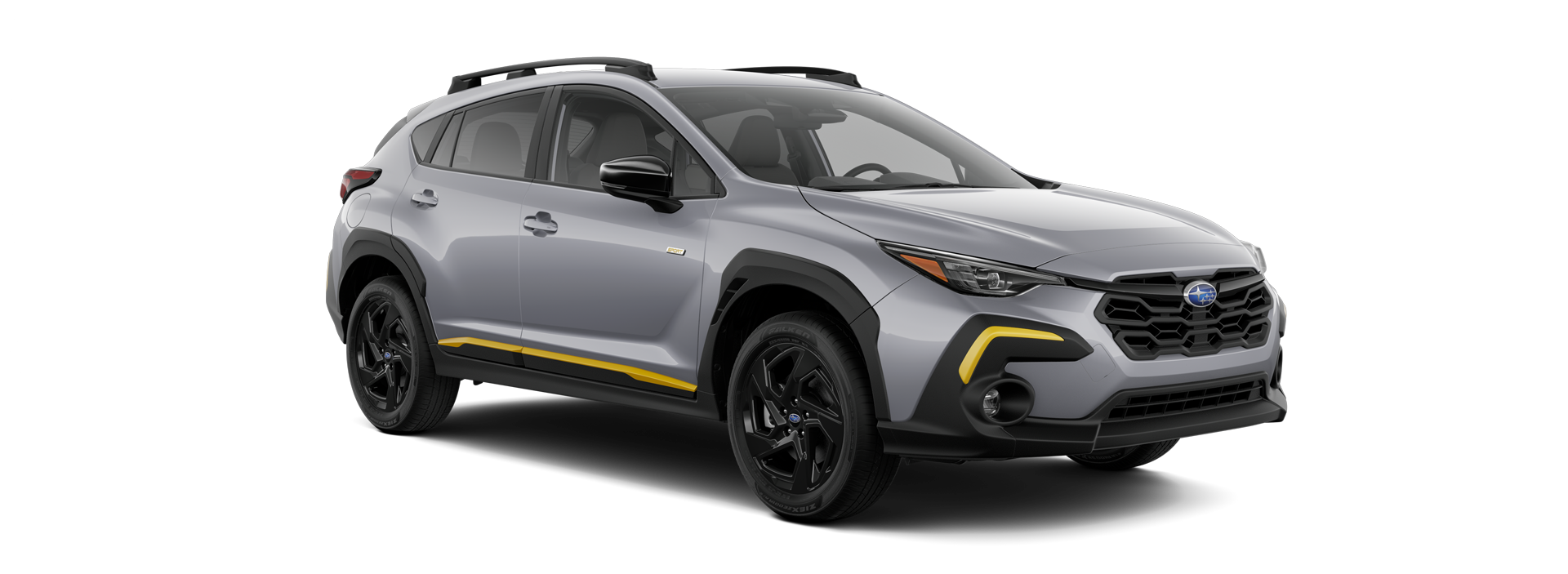 Silver 2024 Subaru Crosstrek Sport with yellow accents and black trim, angled to show front and driver's side.