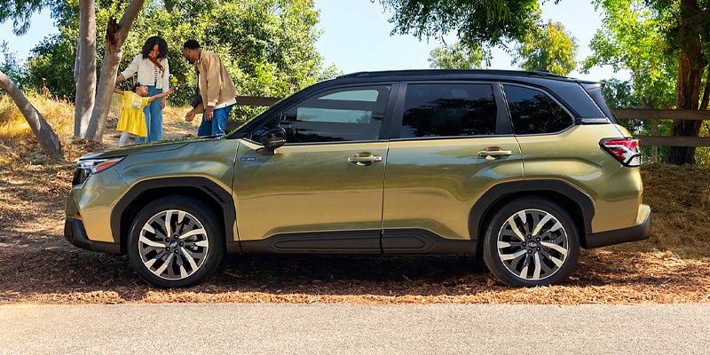 Side Profile of a Green Three-Row SUV