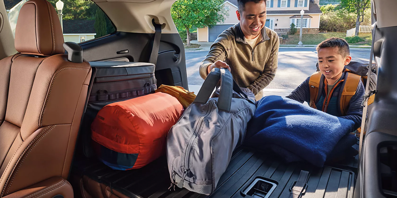 Expansive Cargo Area with Folded Rear Seats Accommodating Luggage and Equipment