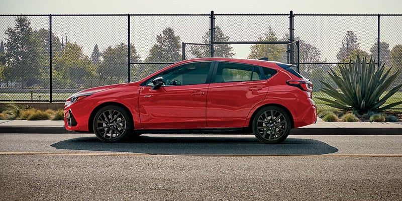 Red Hatchback Side Profile with Sporty Styling