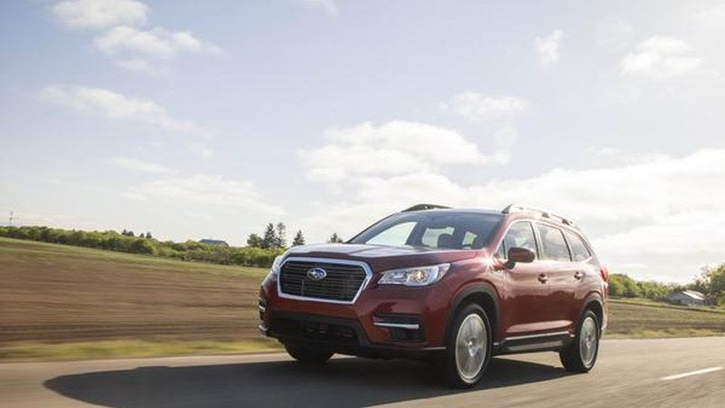2024 Subaru Ascent in red, front three-quarter on a highway