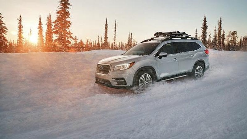 2024 Subaru Ascent in silver, three-quarter view in the desert