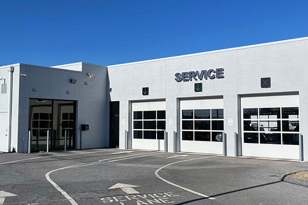 Subaru service center entrance and drive-in bays in Glen Burnie, MD